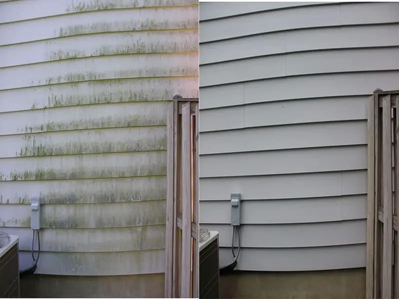 Pressure washing a house with vinyl siding